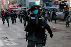 Hong Kong police arrest more than 200 as pro-democracy protests return