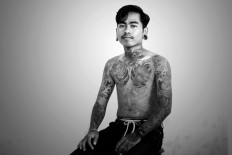 Kadek has always been passionate about tattoos. JP/M Azis Dicky