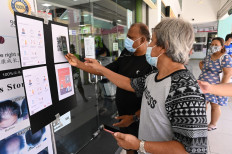 Back to work? Not without a check-in app, immunity passport