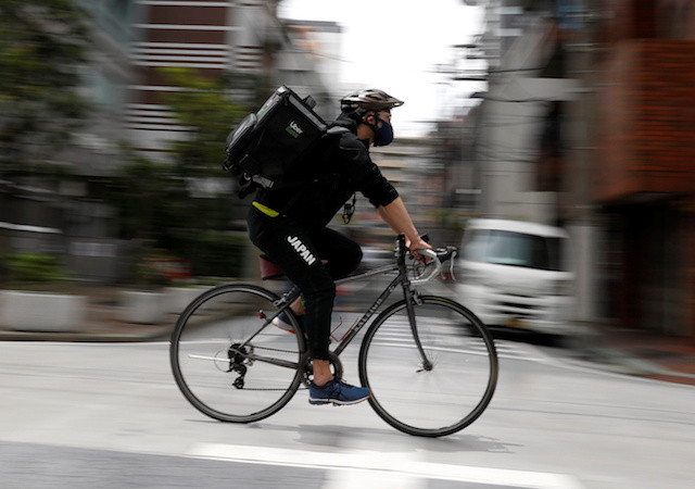 uber eats delivery driver bicycle