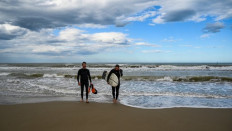 Back on board: Italy's surfers hit beach after lockdown