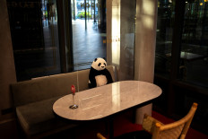 Panda dolls kick pandemic blues for Thai diners