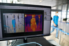 A screen showing a thermal imaging system is seen as Israel's airport authority announced a pilot programme revealing what passengers leaving Israel should except as air travel gradually returns to normal after weeks of bare minimum flights due to the coronavirus disease (COVID-19) outbreak, at Ben Gurion International Airport, in Lod, near Tel Aviv, Israel May 14, 2020. 