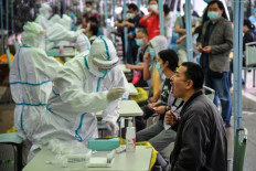 China's Wuhan says tested almost a third of residents for coronavirus since April