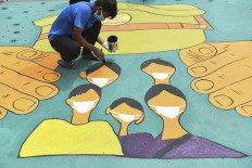 Sign of the times: Mumbai green lights women figures on traffic signals