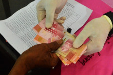 Govt to disburse cash transfers for workers to bolster spending