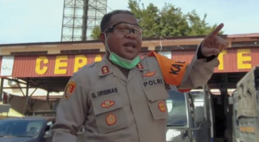 Sing the pandemic away: Papua rapper, police chief collaborate to fight COVID-19