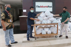 Tanoto Foundation hands out COVID-19 aid to disabled people