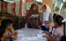 Gaza girl, 13, teaches neighborhood children during school closure