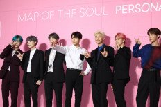 Big-brand BTS promotions disappear as band sparks uproar in China