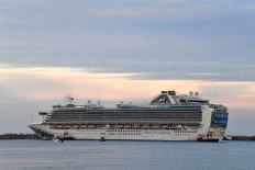 The cruise ship Ruby Princess departs from Port Kembla, some 80 kilometres south of Sydney, on April 23, 2020, after a few hundred virus-free crew members disembarked to begin the process of repatriation to their home countries. 