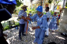 A Mambo, a voodoo priestess, dances at a ceremony during the outbreak of the coronavirus disease (COVID-19), in Port-au-Prince, Haiti May 1, 2020. Picture taken May 1, 2020. 