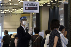 Office cluster pushes Tokyo coronavirus cases to 1-1/2-month high: NHK