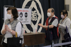 Japan eyes fresh $1.1t stimulus to combat pandemic pain