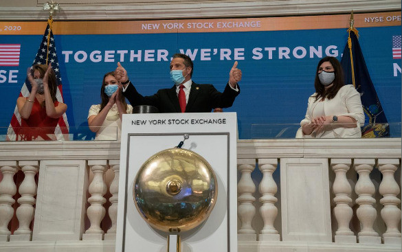 NY governor rings opening bell at exchange as traders return
