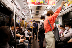 Japan eyes partial reopening to business trips: Yomiuri daily