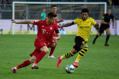 Bayern Munich down Dortmund to close on Bundesliga title