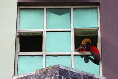 Looking in, looking out: World emerges from lockdown with mixed feelings