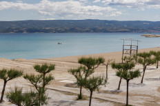 Girls enjoy a bath at the Adriatic Sea in Omis, following the outbreak of the coronavirus disease (COVID-19), Croatia, on May 26, 2020. 