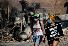 Reuters cameraman hit by rubber bullets as police disperse protesters