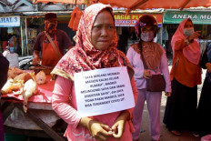  Indonesia rolls out public shaming for virus violators