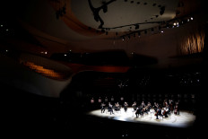 Playing to an empty room: Paris orchestra plays Strauss in COVID-19 era