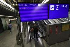 A screen showing Lufthansa flight LH 342 to Tianjin, China (the first post-lockdown flight departing Europe for China) is pictured at the airport in Frankfurt am Main, western Germany, on May 29, 2020. 