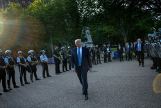 US President Donald Trump leaves the White House on foot to go to St John's Episcopal church across Lafayette Park in Washington, DC on June 1, 2020. - US President Donald Trump was due to make a televised address to the nation on Monday after days of anti-racism protests against police 
brutality that have erupted into violence. The White House announced that the president would make remarks imminently after he has been criticized for not publicly addressing in the crisis in recent days. AFP/ Brendan Smialowski 