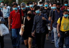 Singapore plans wearable virus contact tracing device for all