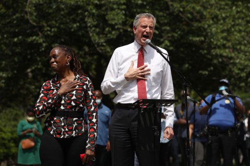 New York Mayor Bill de Blasio speaks to an estimated 10,000 people as they gather in Brooklyns Cadman Plaza Park for a memorial service for George Floyd, the man killed by a Minneapolis police officer on June 04, 2020 in New York City. Floyds brother, Terrence, local politicians and civic and religious leaders also attended the event before marching over the Brooklyn Bridge.   