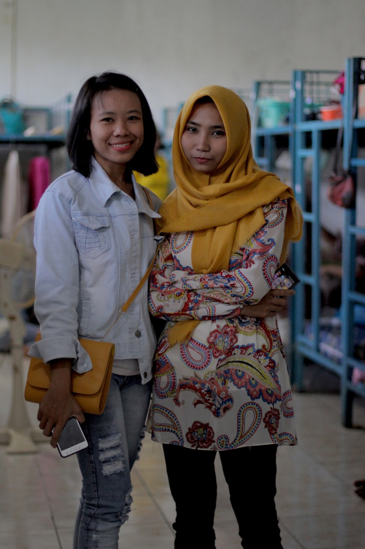 Big dreams: Two prospective Indonesian migrant workers - Sukma and Meri - undergo a training program to become a caretaker in Taiwan, ranging from helping the elderly exercise to Mandarin classes.