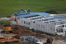  Singapore quarantines migrant workers after virus cases 