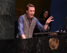 Philippe Cousteau Jr. gestures while speaking during the International Day of Happiness at the UN on the theme 'Young People in Support of Climate Action' in New York on March 20, 2015. 