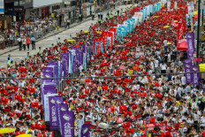 Hong Kong seethes one year on, but protesters on the back foot