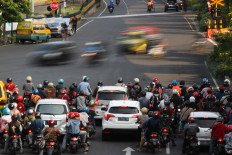 As COVID-19 transmission rate soars, Surabaya urged to restore restrictions