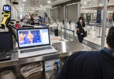 This picture taken on June 9, 2020 shows a feed on a laptop screen from an infrared camera monitoring the ambient body temperatures of incoming travelers upon their arrival at Cyprus' Larnaca International Airport, as part of screening for symptoms of COVID-19 coronavirus disease. 