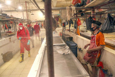 Imperiled by new clusters, market vendors gear up for their health