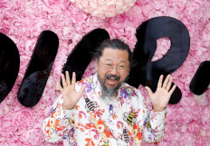 Japanese artist Takashi Murakami attends the Dior Men's Spring/Summer 2019 fashion show on June 23, 2018 in Paris.