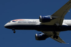 A British Airways passenger plane comes in to land at London Heathrow airport in London, Britain, on May 21, 2020. 