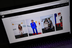 The lookbook for British fashion designer Vivienne Westwood's Autumn/Winter 2021 collection is displayed on the London Fashion Week website, in London on June 12, 2020. 
