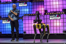 Boston Dynamics Founder and CEO Marc Robert presents Spot, a robot dog, on the last day of the Web Summit in Lisbon on November 7, 2019. 