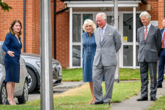 Britain's Charles, Prince of Wales and Camilla, Duchess of Cornwall arrive as they meet with workers who have responded to the coronavirus disease (COVID-19) outbreak, at Gloucestershire Royal Hospital, in Gloucester, Britain June 16, 2020.