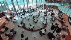 Businesses welcome eased curbs, but risk remains amid high COVID-19 toll