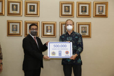 UNDP donates surgical masks to help Indonesia fight COVID-19