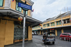 A lone tuk-tuk driver waits for customers at Khao San Road, empty of tourists due to the restrictions on entry by foreigners into Thailand due to the COVID-19 novel coronavirus, in Bangkok on June 16, 2020.
