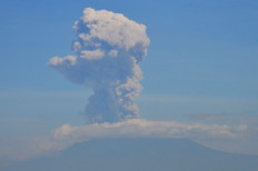 Mount Merapi erupts twice, officials advise residents to be on alert