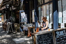 Former virus hotspot New York reopens as cases spike elsewhere