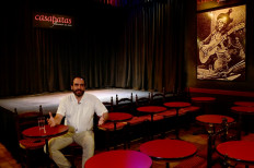 Casa Patas owner Martin Guerrero gestures during an interview with AFP in Madrid on June 15, 2020. 