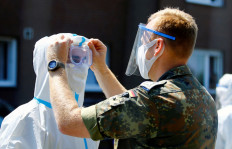 Explainer: Why COVID-19 can run rife in meatpacking plants