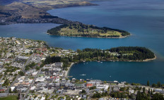 This photo taken on December 31, 2013 shows the city of Queenstown on the shores of Lake Wakatipu. 
